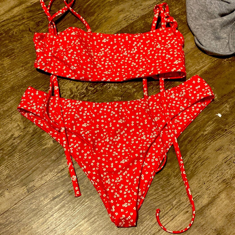red flower bathing suit barely worn size xs could fit a small